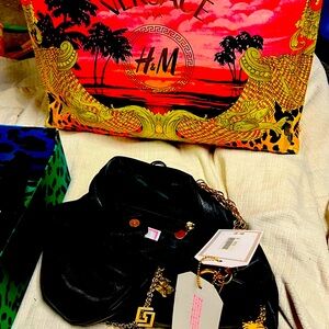 Versace for H&M 2011 collab black leather purse 
charms on it snap closure NWT